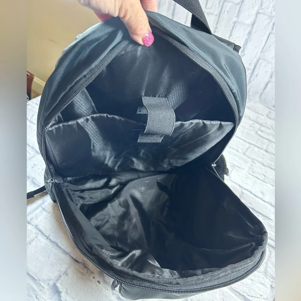 Adidas Black and White Laptop Backpack.